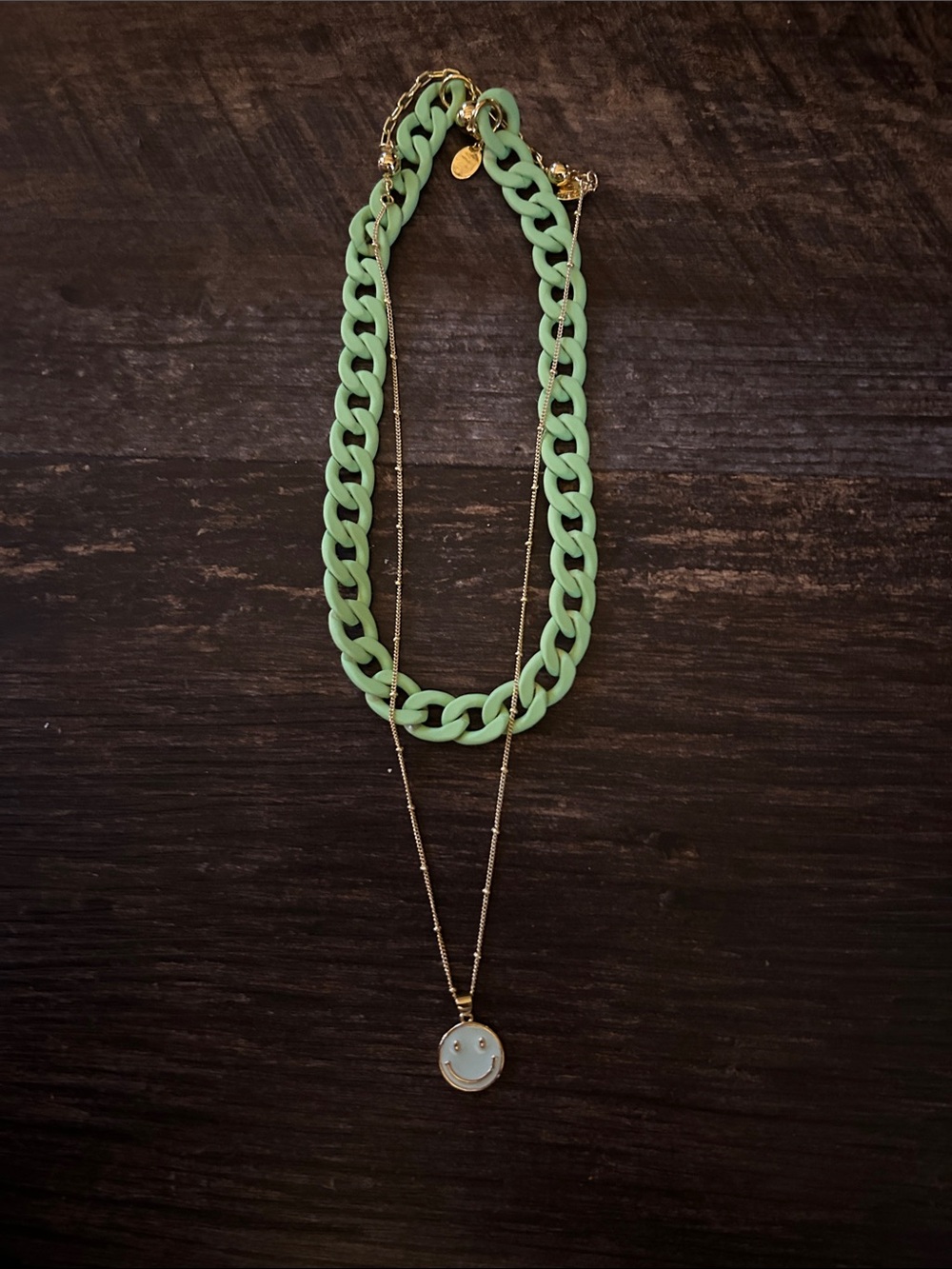 By Alexa Rae Shakira and a gold station necklace with smile charm in lime green